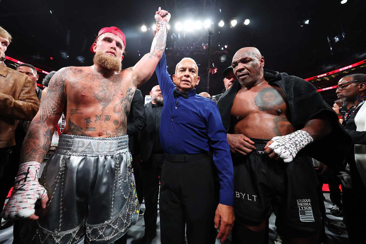 Jake Paul, left, and Mike Tyson after their fight in November. 