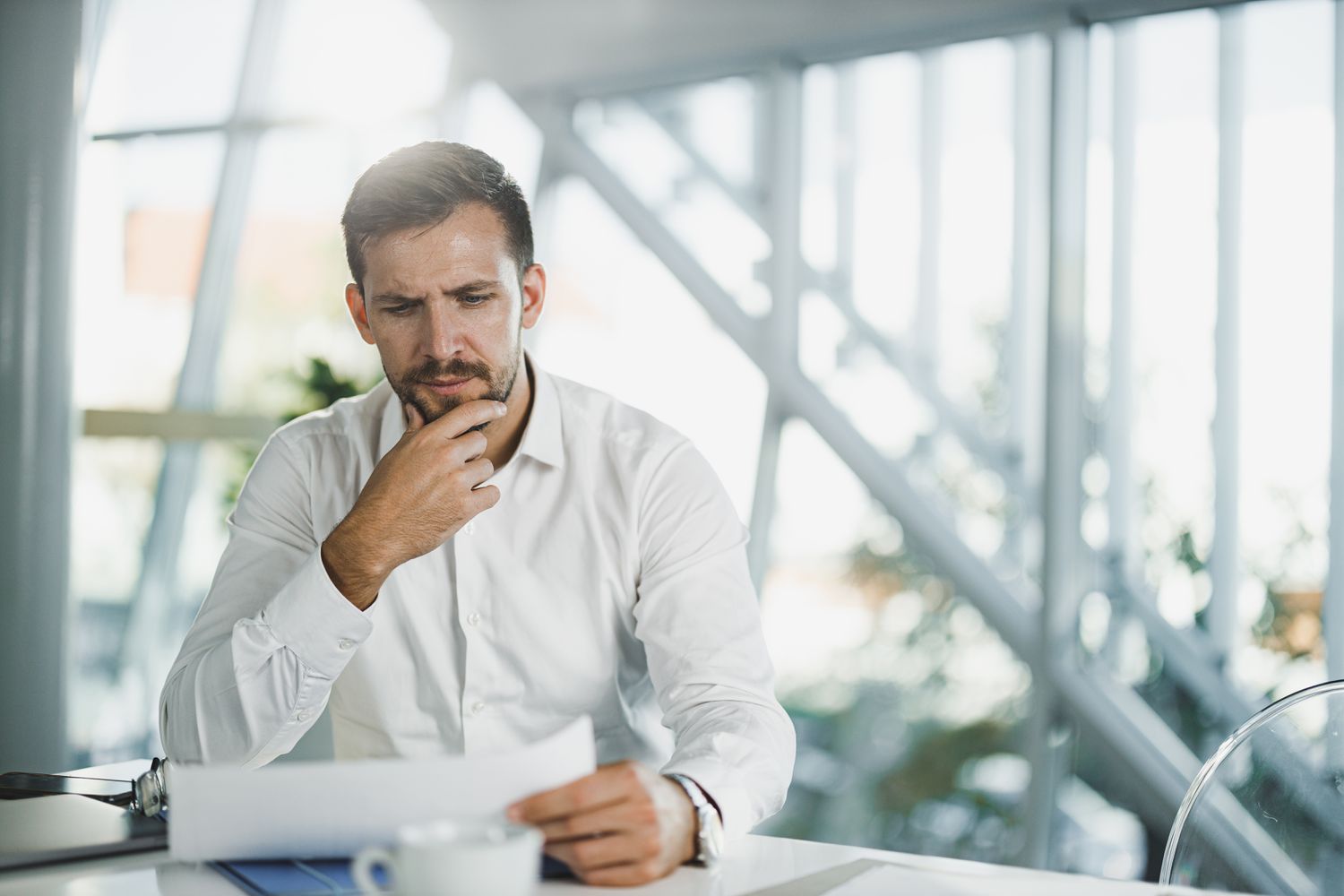 A business executive reviews documents