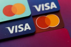 MasterCard and Visa cards are seen in this illustration photo taken in Krakow, Poland, on March 29, 2024 