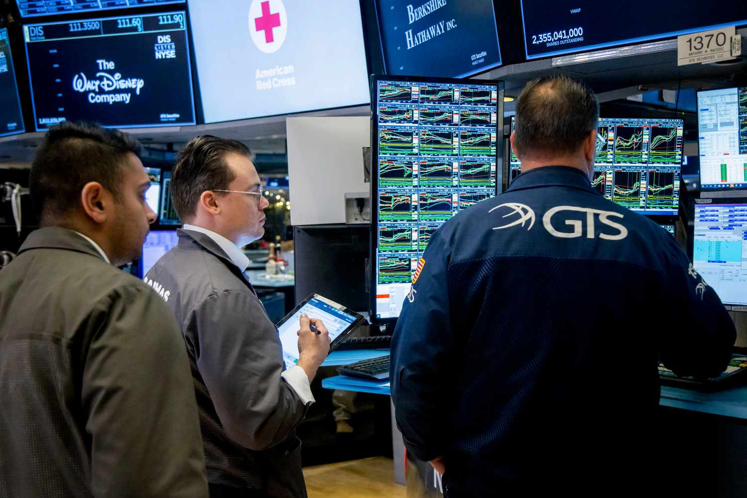 Traders work on the floor of the New York Stock Exchange