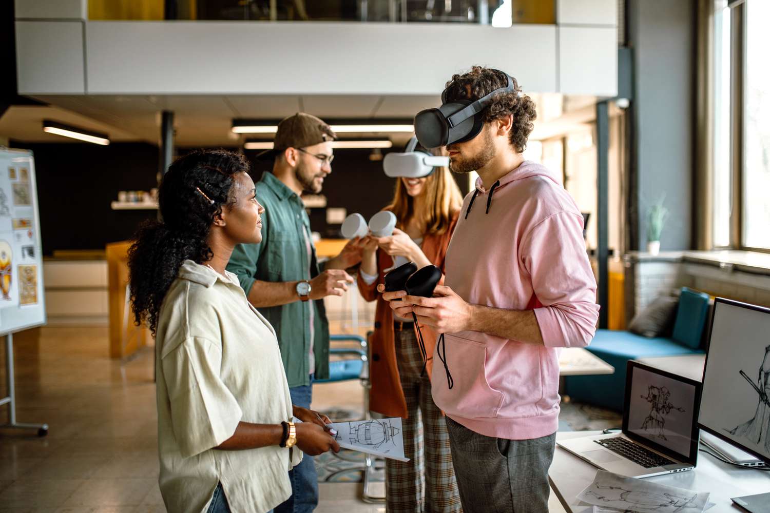 People testing AR headsets for video games in company's office