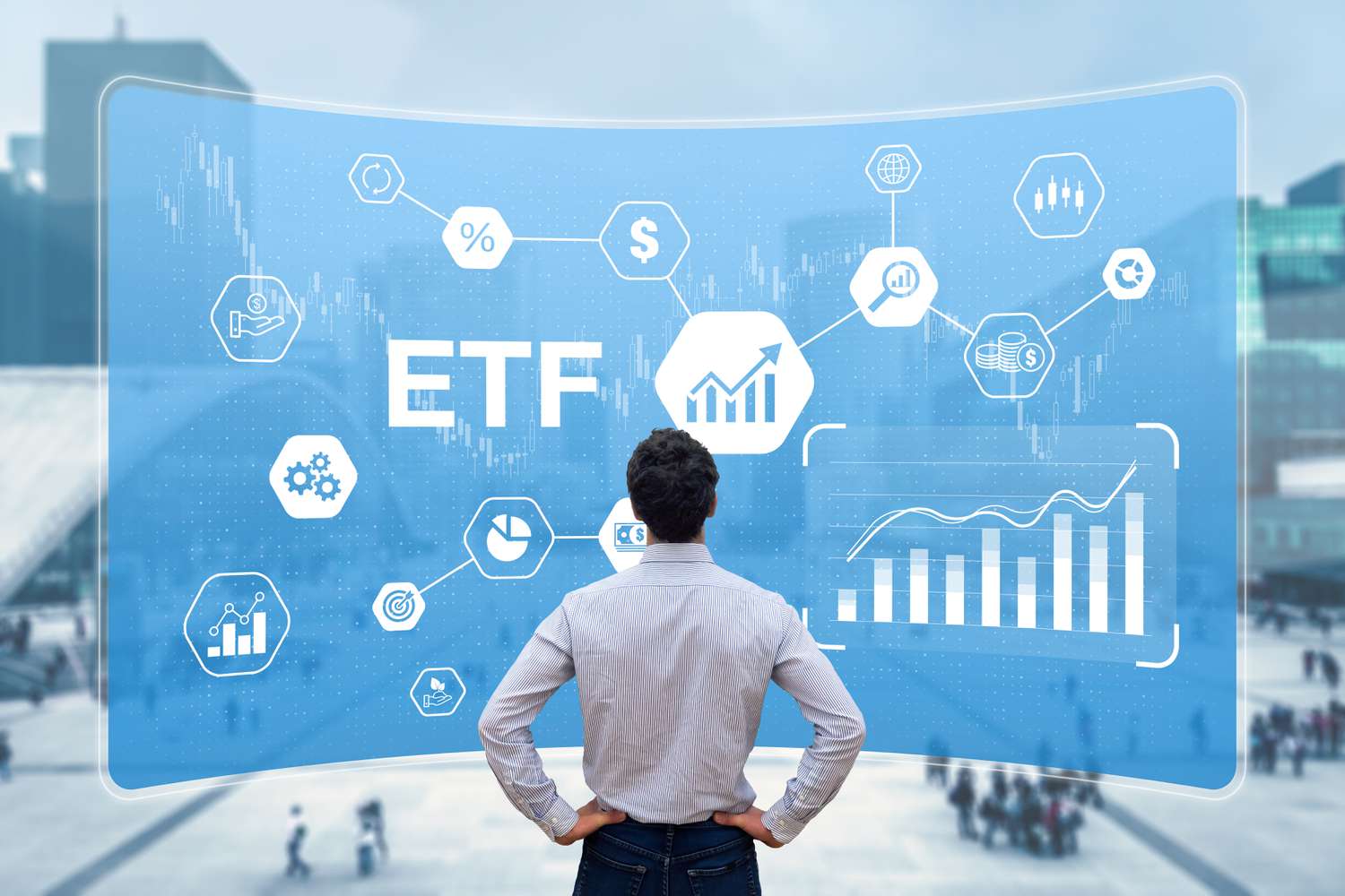 Person standing in front of a screen with digital ETF symbols
