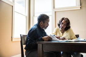 A couple going over financial information