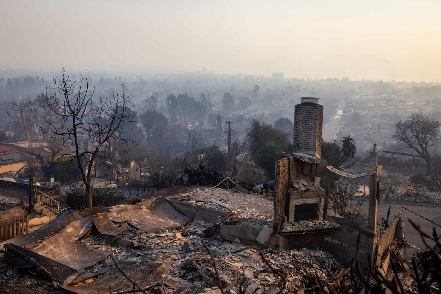 A home reduced to ashes during the aftermath of the Palisades Fire in Palisades, California, US, on Thursday, Jan. 9, 2025.