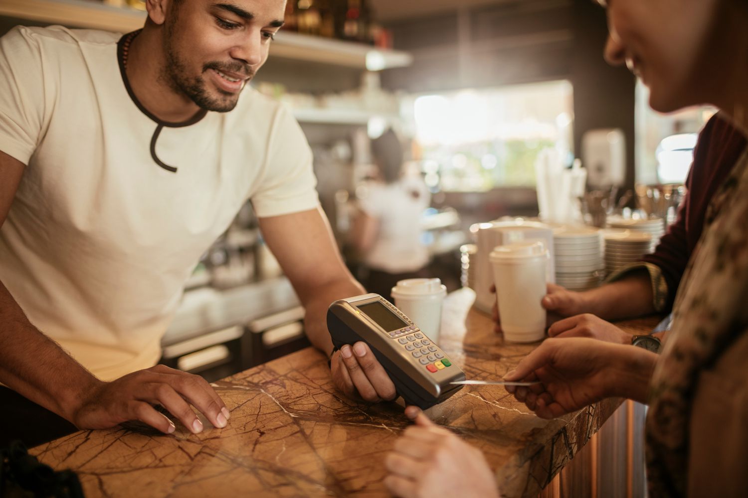 Making a sale at cafe