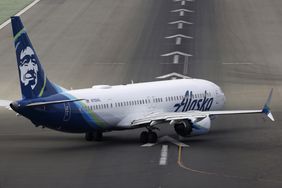 An Alaska Airlines Boeing 737 MAX 9 airplane taxis on the runway before departing from San Diego International Airport on Nov. 18, 2024 