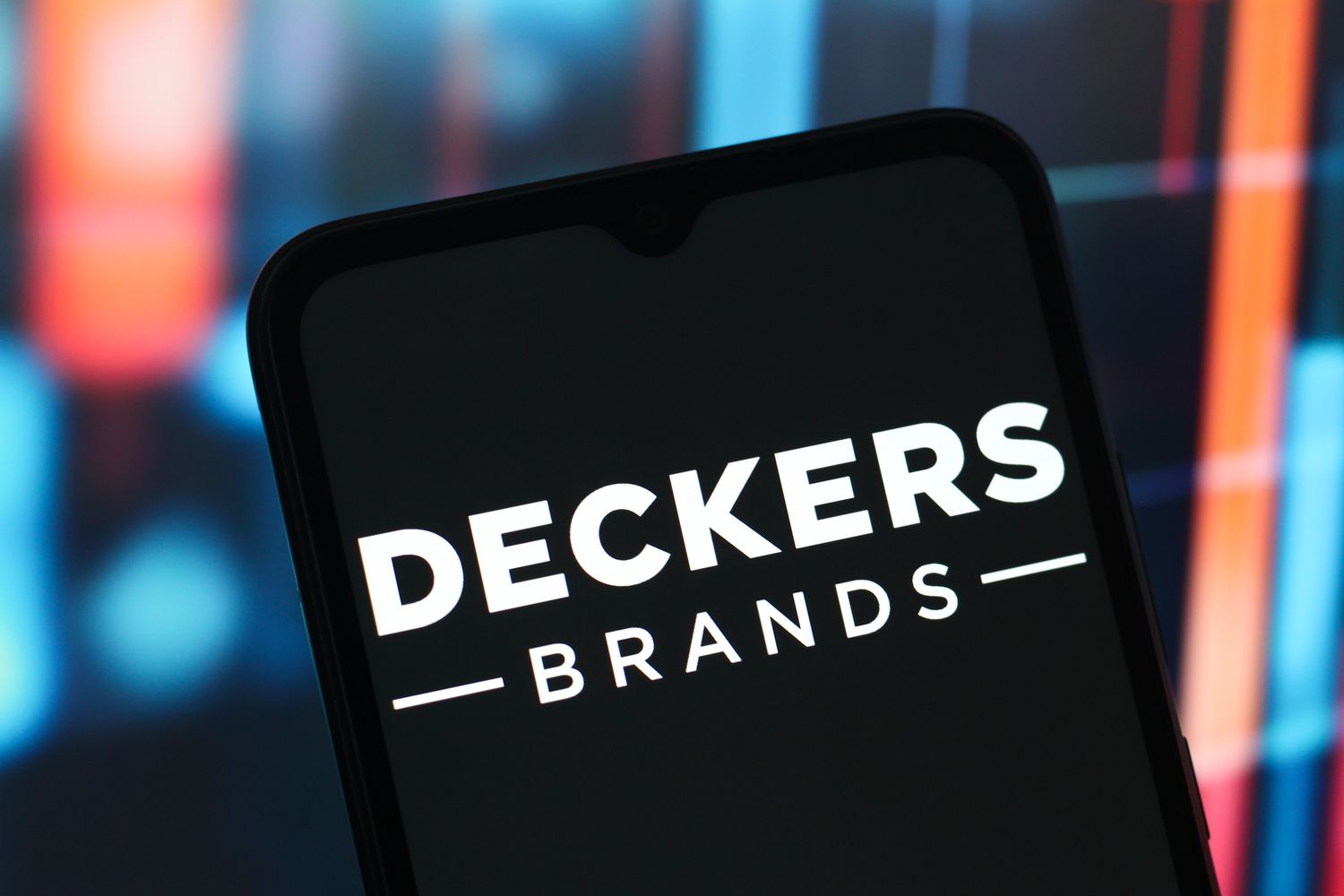  the Deckers Outdoor Corporation (Deckers Brands) logo is seen displayed on a smartphone screen. 