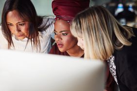 Women in discussions about their student loan debts.