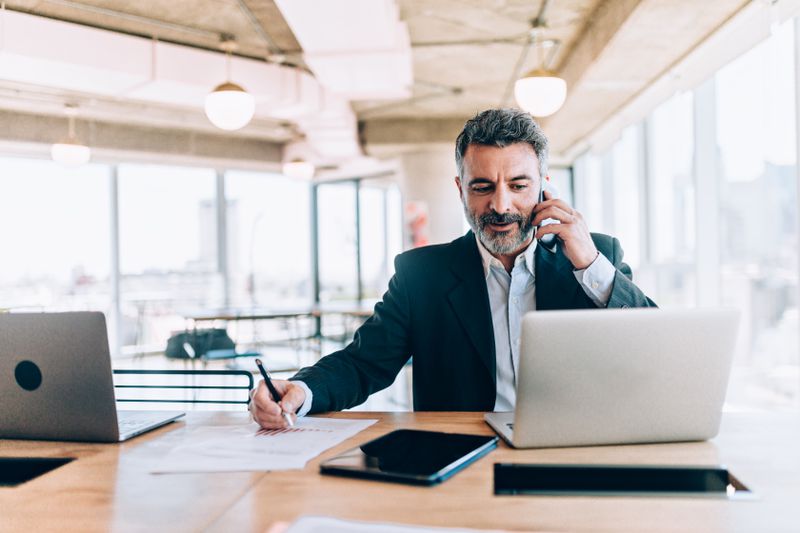 Worker in an office on the phone