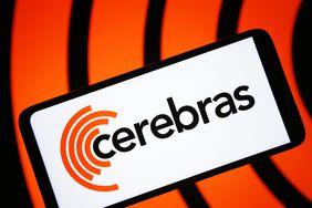 The Cerebras logo is seen on a phone screen in front of a black and orange background
