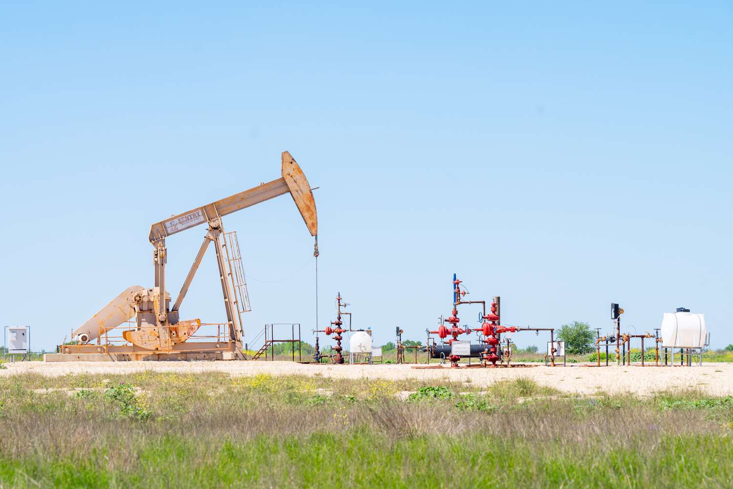 An oil pumpjack is seen in a field in Gillett, Texas
