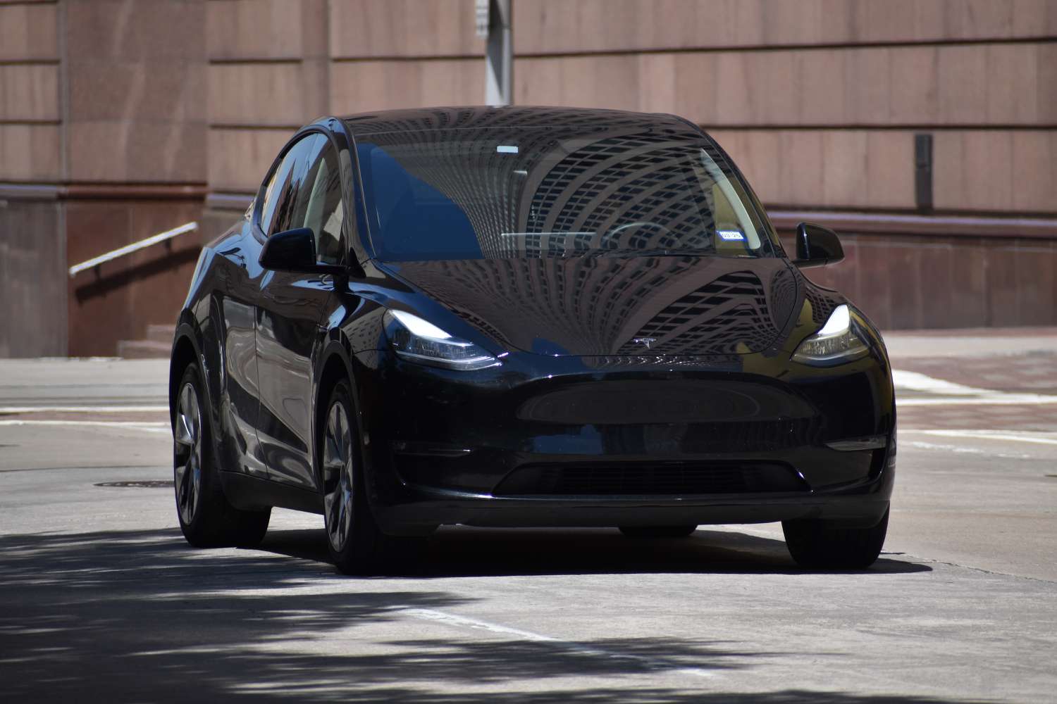 A black Tesla Model Y. 