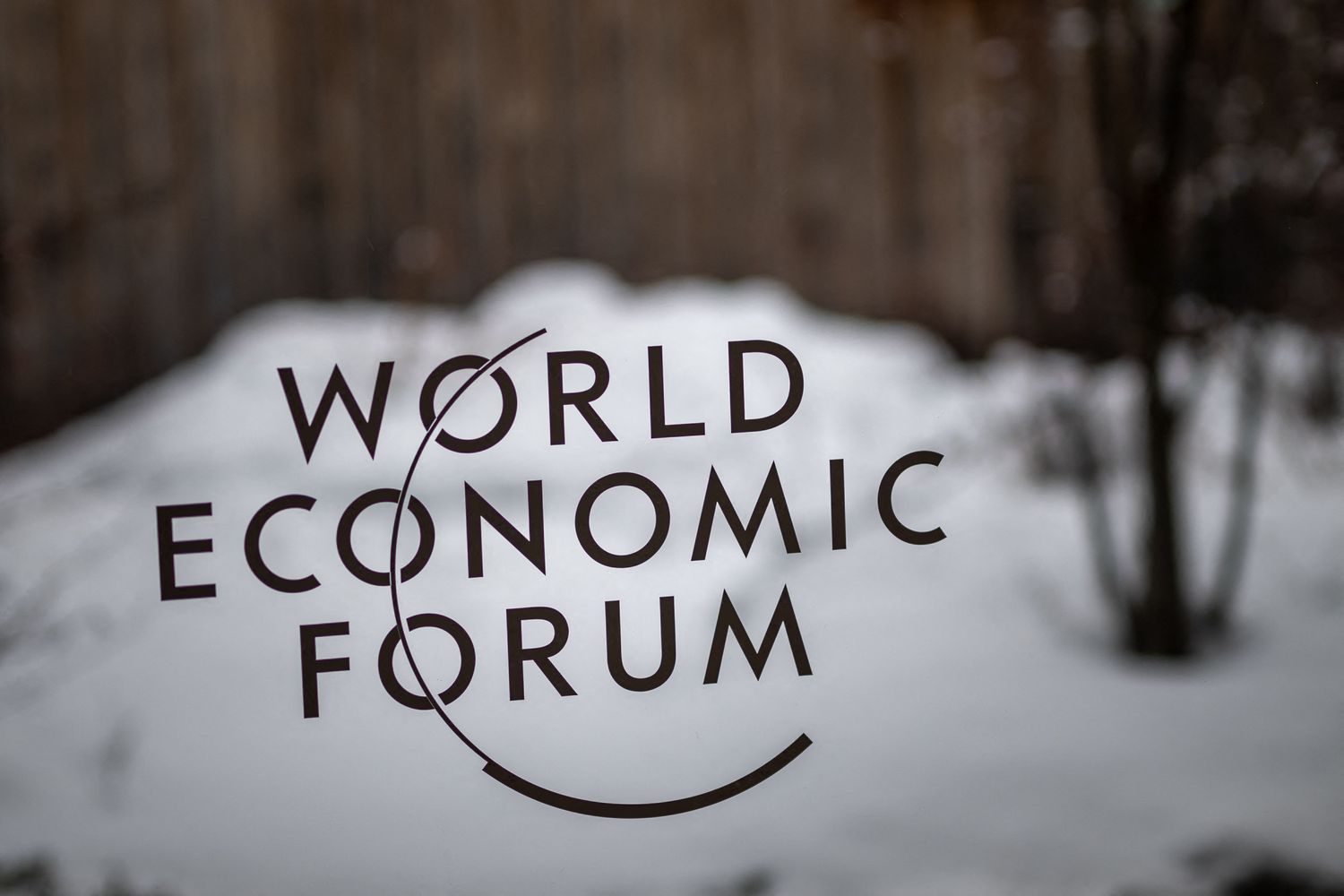 World Economic Forum logo on a sign.