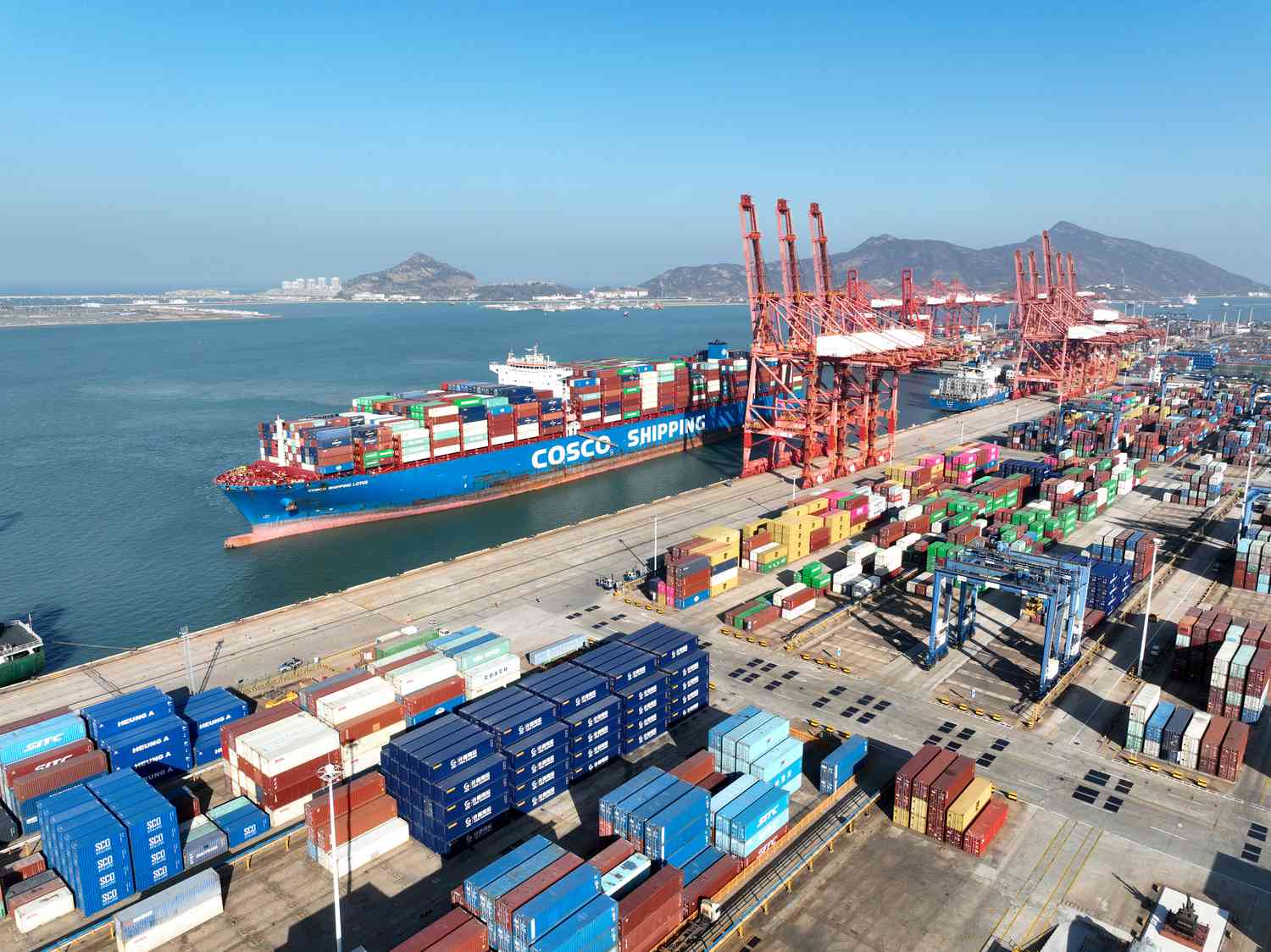 A COSCO container ship preparing to dock