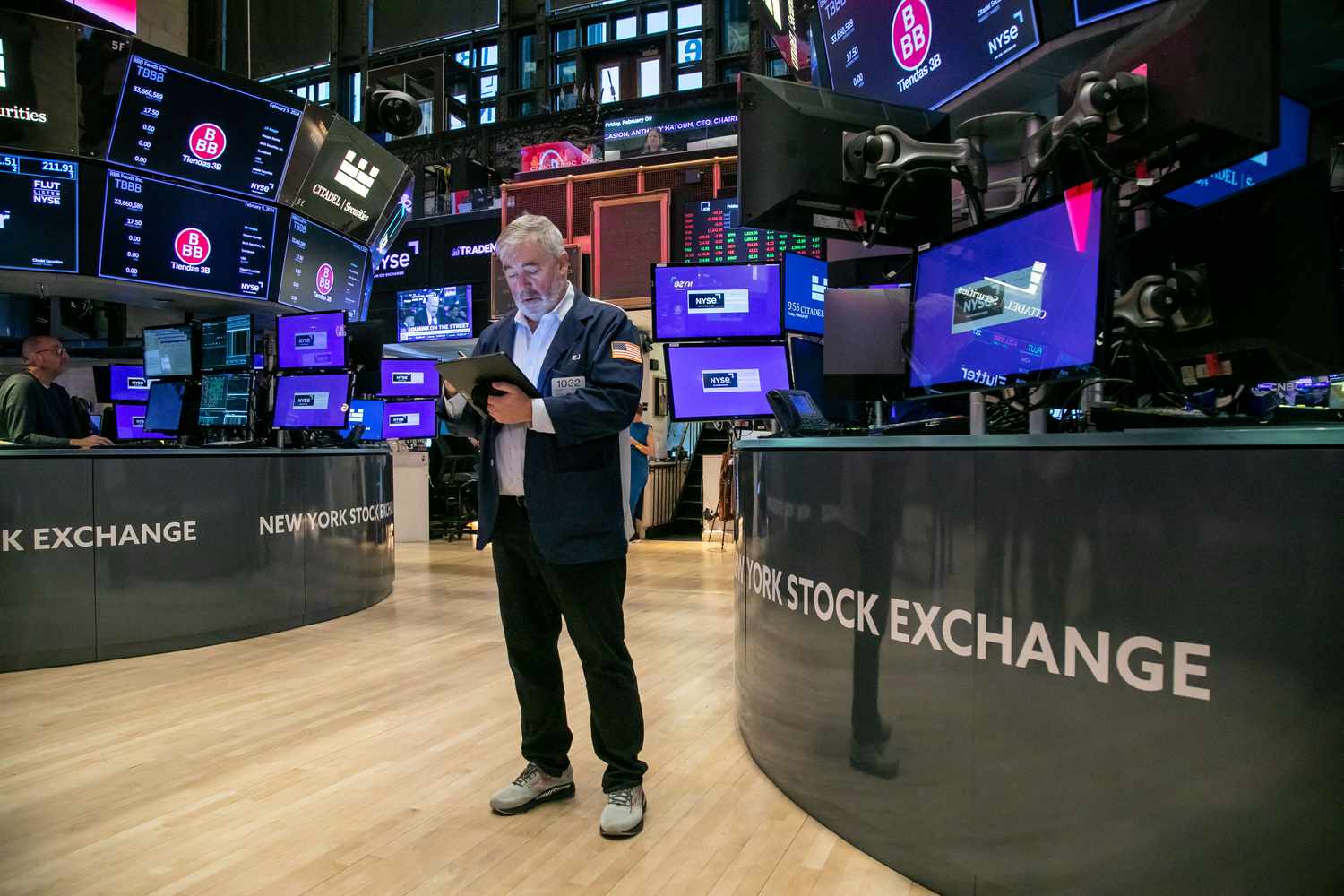 A trader works on the floor of the New York Stock Exchange.