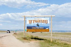 Wyoming welcome sign on a highway