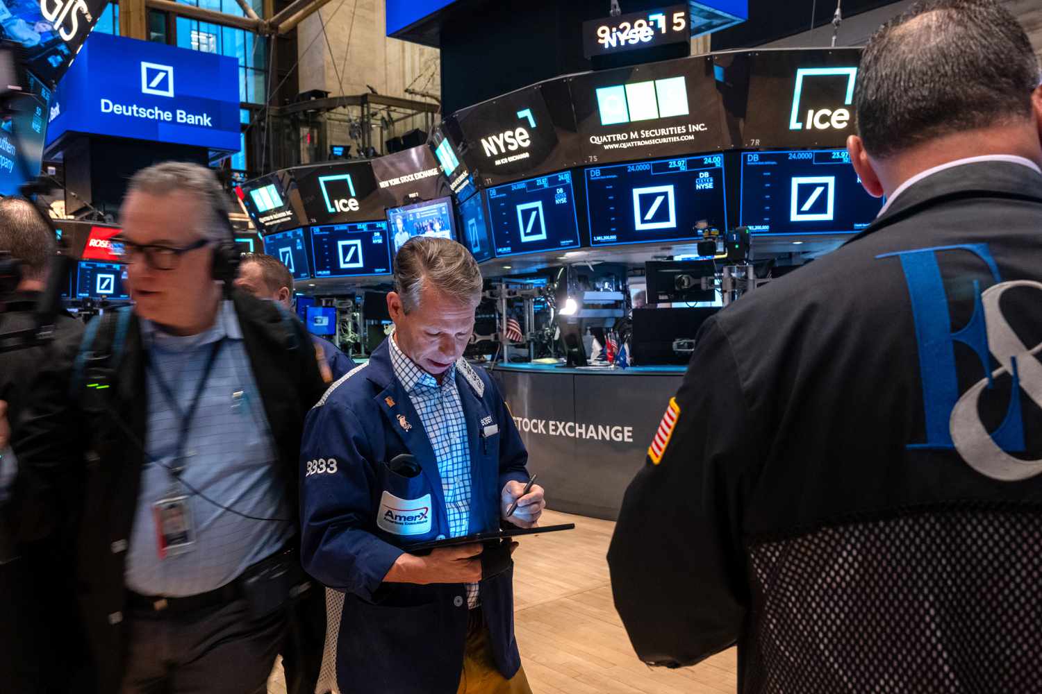 Traders work on the floor of the New York Stock Exchange