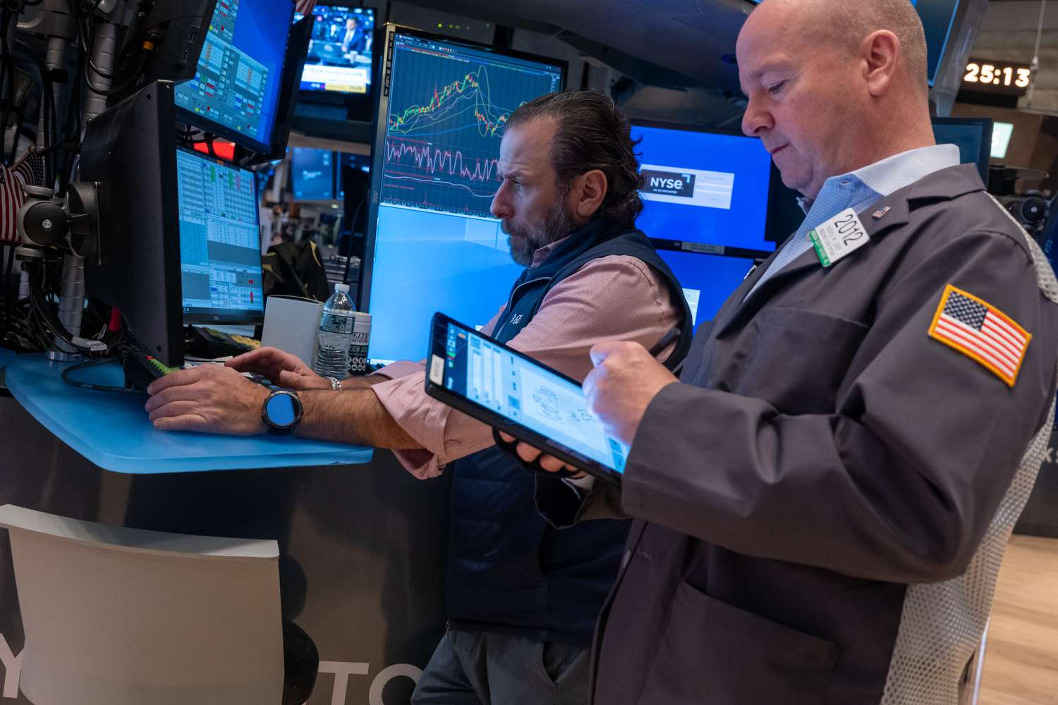 Traders work on the New York Stock Exchange (NYSE) floor