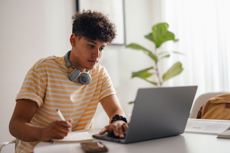 Young man working on a laptop
