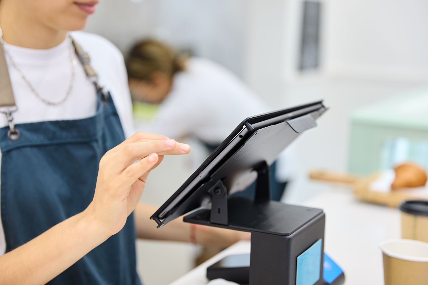 Barista at cash register