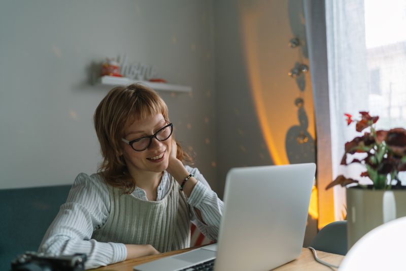 Woman sitting at computer