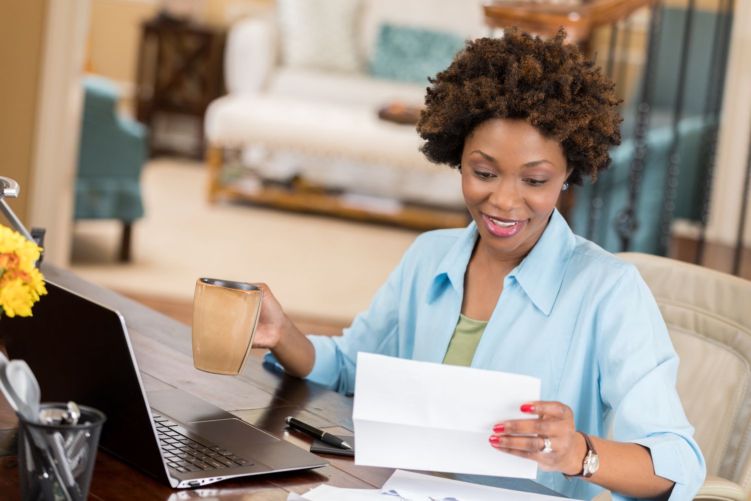 An investor smiles as the see the balance of their Roth IRA account after compounding.