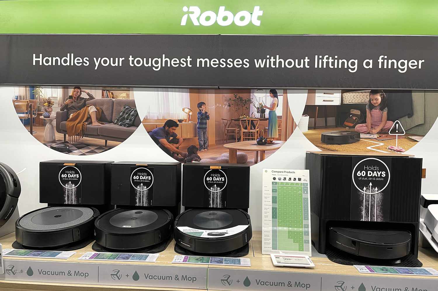 Roomba vacuums at an iRobot display.