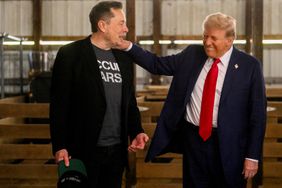 Elon Musk, chief executive officer of Tesla Inc., left, and former US President Donald Trump, prior to a campaign event at the Butler Farm Show in Butler, Pennsylvania, US, on Saturday, Oct. 5, 2024.