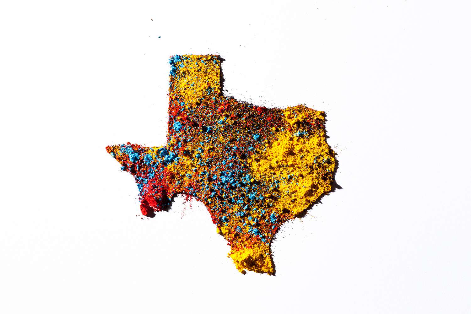 Map of Texas, USA with colored powder.
