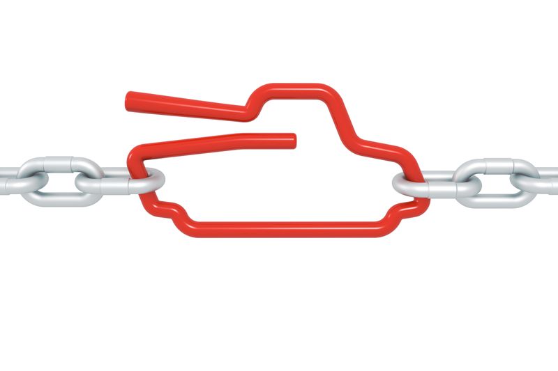 Red tanksymbol blocked with metal chains - military concept