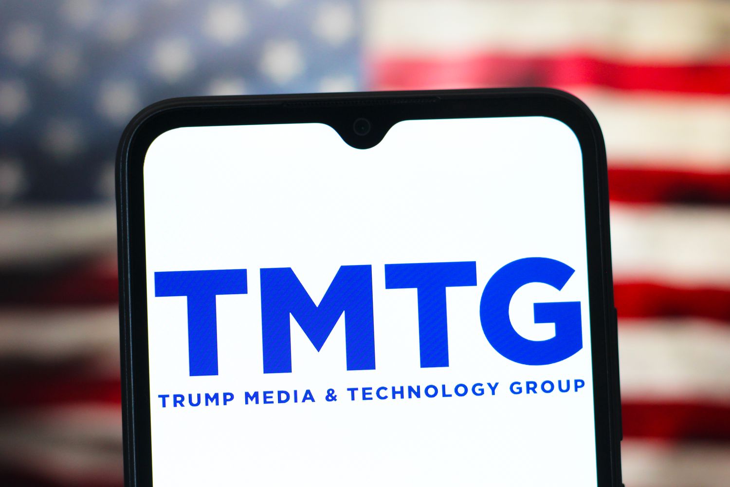 Trump Media & Technology Group logo is seen displayed on a smartphone screen