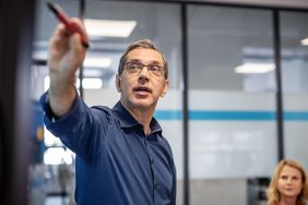 Businessman giving a presentation in an office