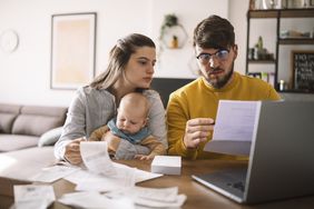 Couple paying their taxes