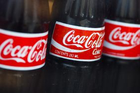 Bottles of Coca-Cola in a shop window. 