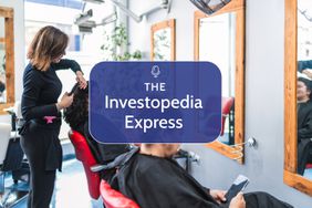 Image of a hair stylist styling a woman's hair in a salon 