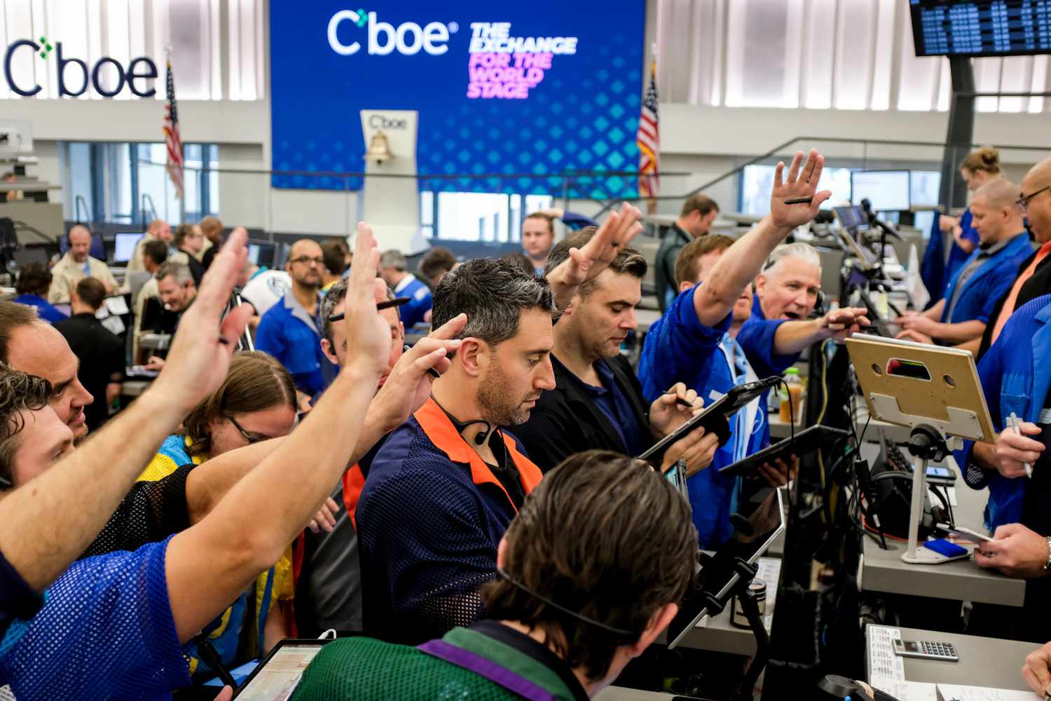 Traders work in the S&P options pit at the Cboe Global Markets exchange in Chicago