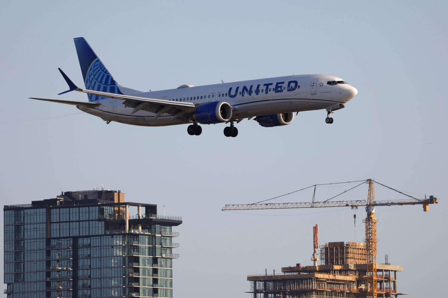 An United Airlines Boeing 737 MAX 9 airplane approaches San Diego International Airport