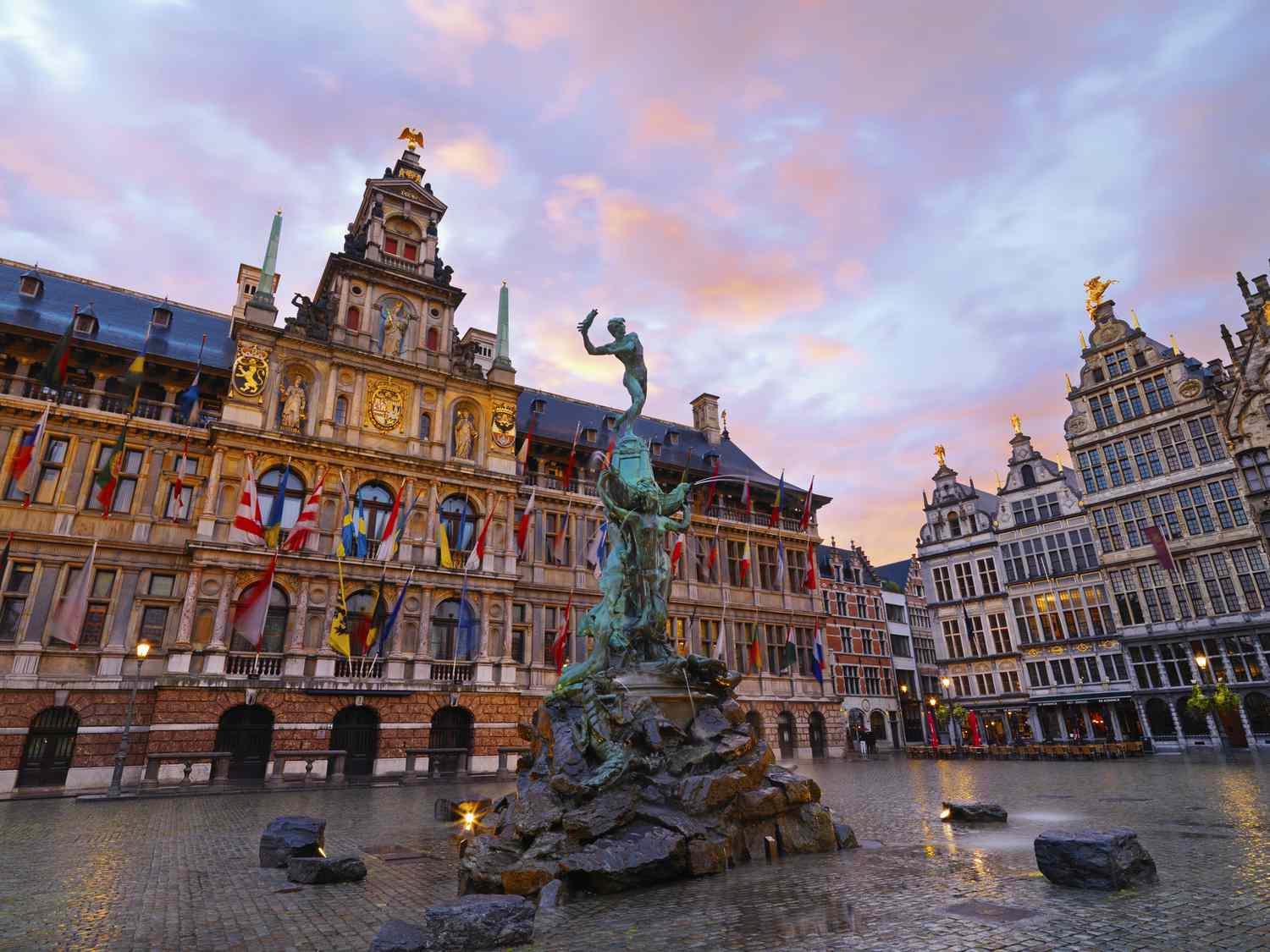 Brabo fountain and city hall in Antwerp, Belgium