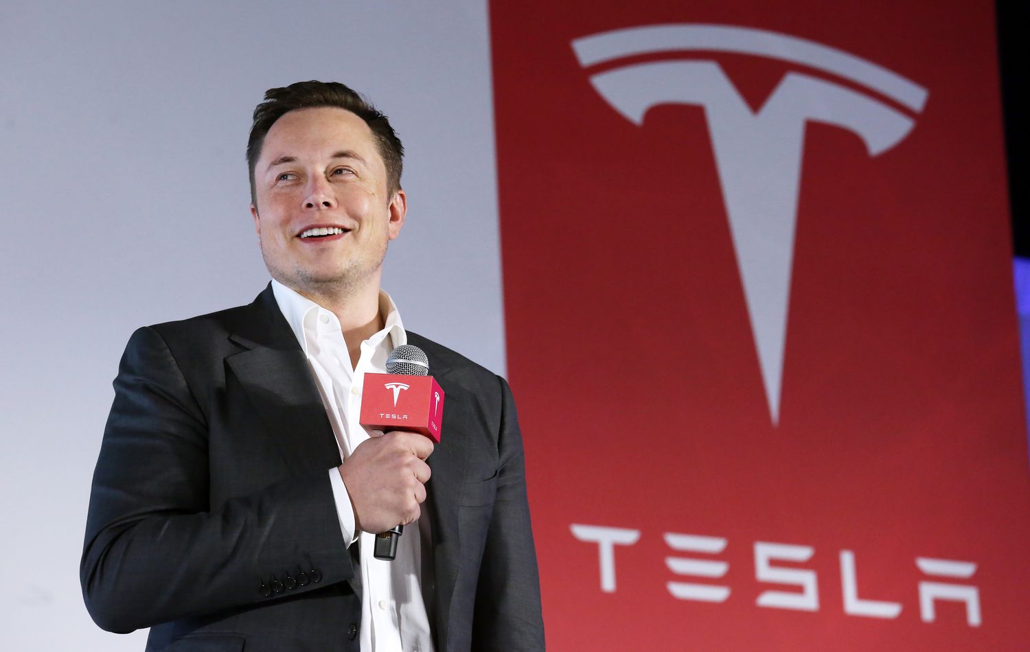 Tesla CEO Elon Musk speaking at an event