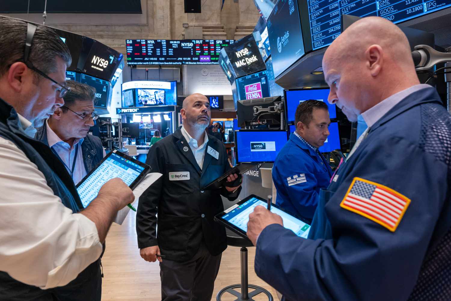 Traders work on the floor of the New York Stock Exchange