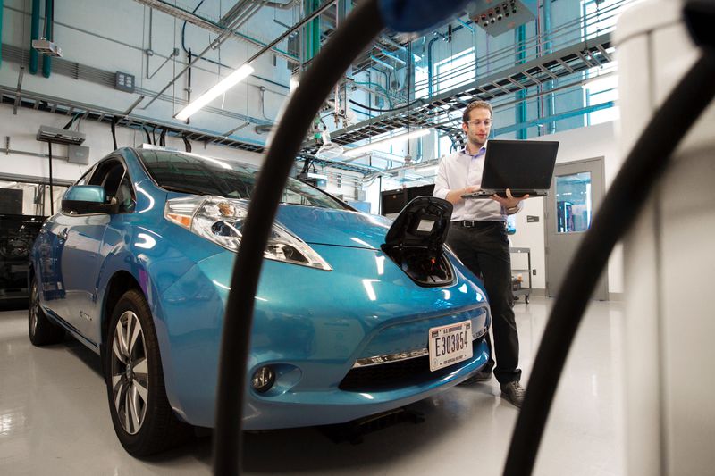 An electric vehicle in a repair shop. 