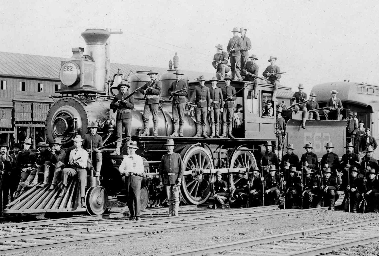 Photograph of soldiers with guns on train during 1894 Pullman Strike