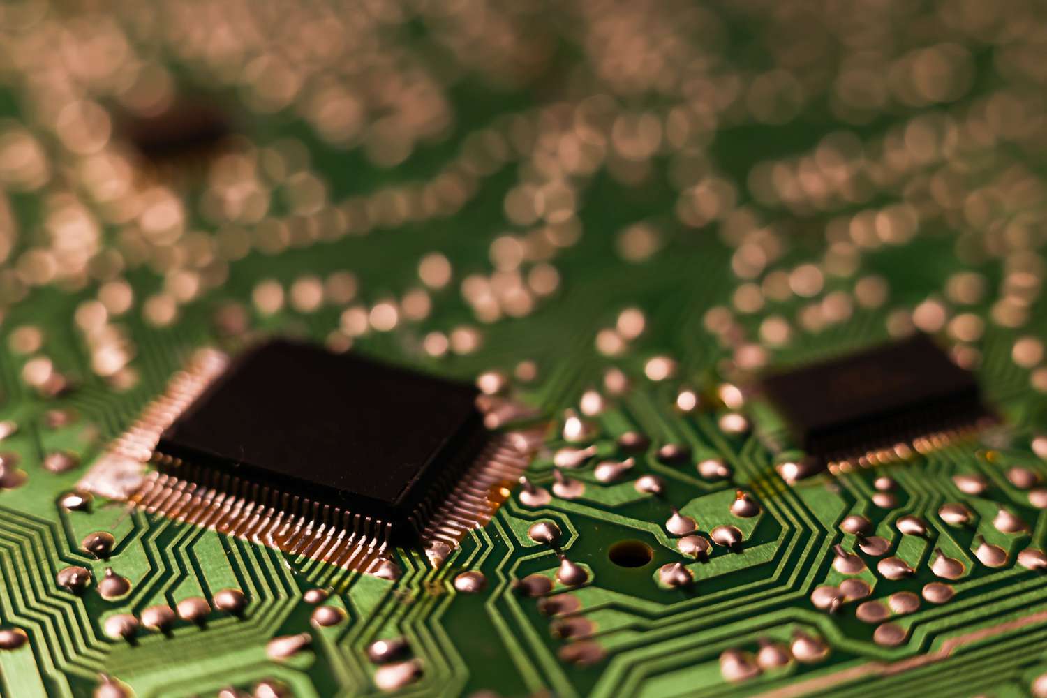 Image of two microchips in a circuit board