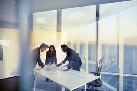 Business colleagues planning together in a meeting in a conference room