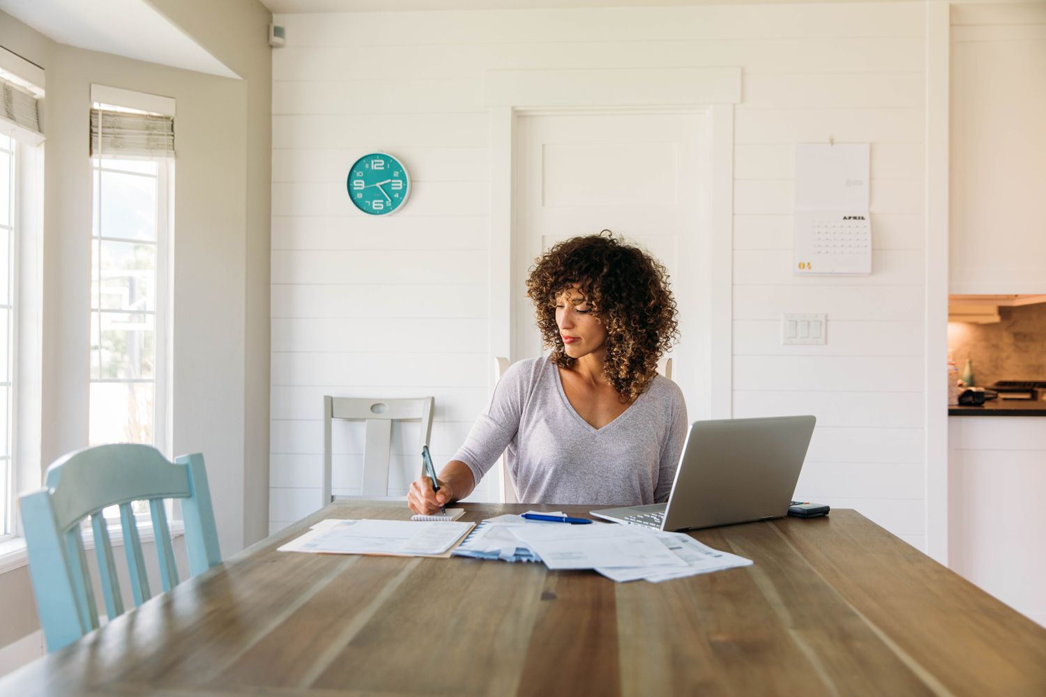 A woman filing her taxes online